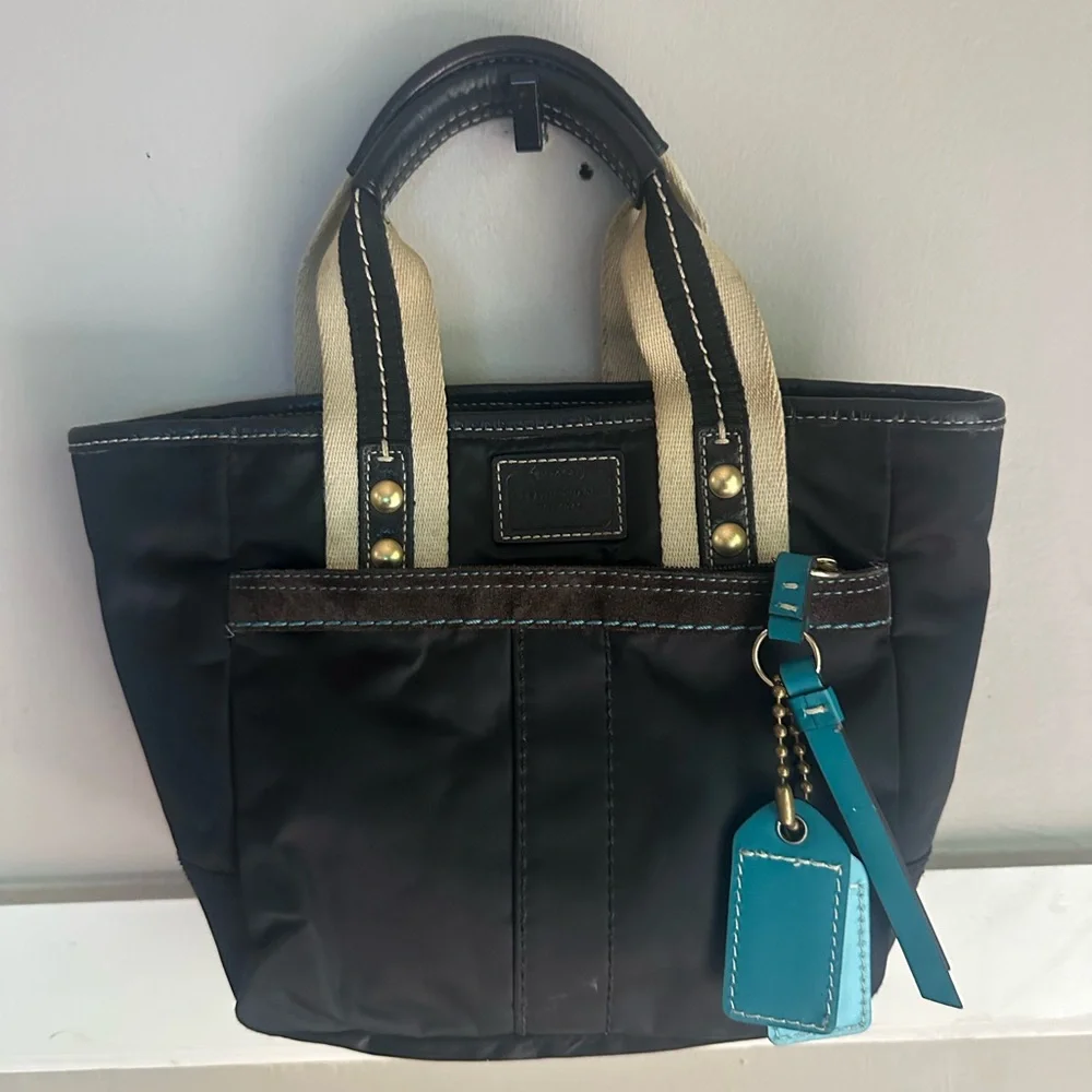 Coach Black Tote with Cream Canvas Handles and Teal Charm